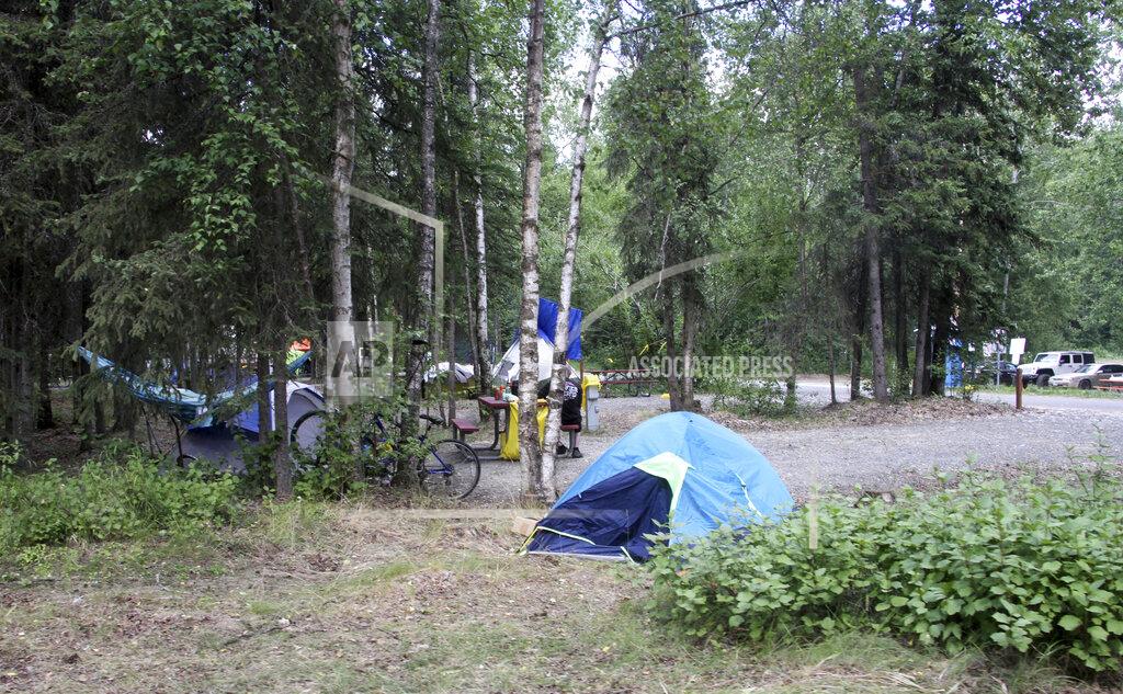 Mark Thiessen Tents are shown Wednesday, July 6, 2022, inside Centennial Park in Anchorage, Alaska. State wildlife officials have killed four black bears in a campground recently set aside for the city's homeless population after Anchorage's largest shelter was closed. (AP Photo/Mark Thiessen)
