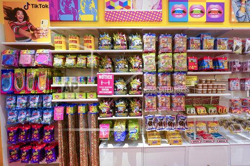 A column of candy, left, featured in TikTok videos is displayed at It'Sugar candy store, Wednesday, Oct. 6, 2021, on the Upper East Side of New York. (AP Photo/Mary Altaffer)