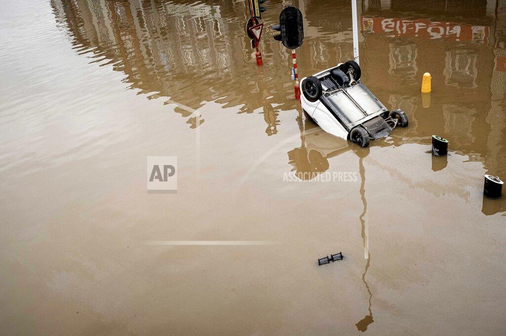 Valentin Bianchi FILE - In this Friday, July 16, 2021 file photo, a car sits submerged in the water after flooding in Chenee, Province of Liege, Belgium. Scientists say there’s something different this year from the recent drumbeat of climate weirdness. This summer a lot of the places hit by weather disasters are not used to getting extremes and many of them are wealthier, which is different from the normal climate change victims. That includes unprecedented deadly flooding in Germany and Belgium, 116-degree heat records in Portland, Oregon and similar blistering temperatures in Canada, along with wildfires. Now Southern Europe is seeing scorching temperatures and out-of-control blazes too. And the summer of extremes is only getting started. Peak Atlantic hurricane and wildfire seasons in the United States are knocking at the door. (AP Photo/Valentin Bianchi, File)
