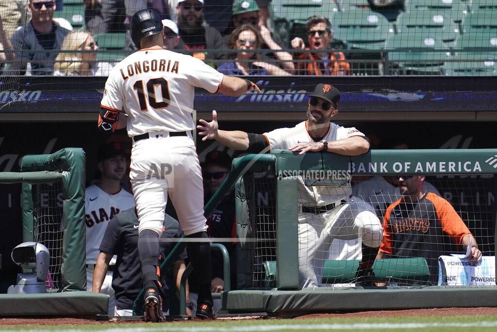 Jeff Chiu San Francisco Giants' Evan Longoria (10) is congratulated by manager Gabe Kapler after hitting a three-run home run during the first inning of a baseball game against the New York Mets in San Francisco, Wednesday, May 25, 2022. (AP Photo/Jeff Chiu)
