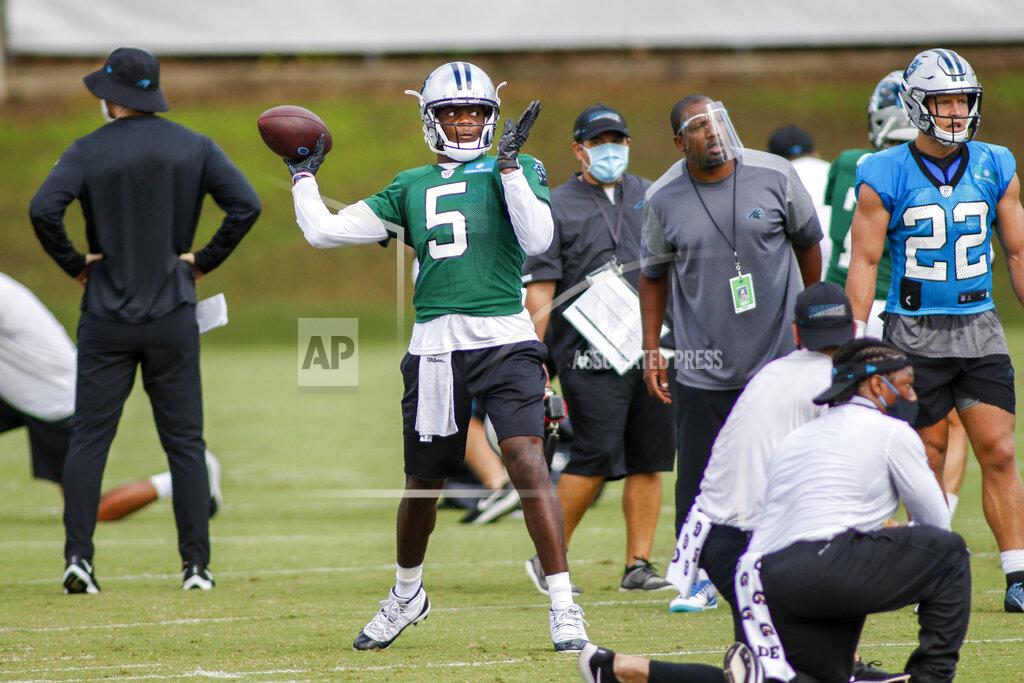 Nell Redmond Carolina Panthers quarterback Teddy Bridgewater (5) throws a pass during NFL football training camp practice Sunday, Aug. 16, 2020 in Charlotte, N.C. (AP Photo/Nell Redmond)