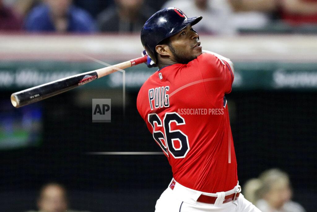 Tony Dejak FILE - In this Sept. 18, 2019, file photo, Cleveland Indians' Yasiel Puig watches his ball after hitting the game-winning RBI-single in the 10th inning in a baseball game against the Detroit Tigers in Cleveland. The free agent outfielder and the Atlanta Braves have agreed to a one-year deal, a person with knowledge of the deal said Tuesday, July 14, 2020. (AP Photo/Tony Dejak, File)