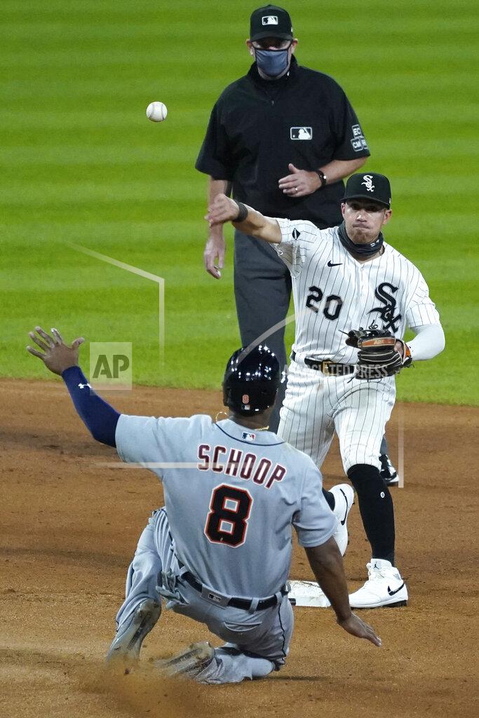 Nam Y. Huh Chicago White Sox second baseman Danny Mendick (20) throws out Detroit Tigers' Jorge Bonifacio after forcing out Jonathan Schoop at second during the sixth inning of a baseball game in Chicago, Wednesday, Aug. 19, 2020. (AP Photo/Nam Y. Huh)