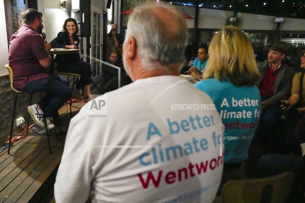 Mark Baker Independent candidate for the inner city seat of Wentworth, Allegra Spender, second left, holds a public forum ahead of next weekend's general election in Sydney, Australia on May 16, 2022. Australia's government, considered a laggard on combating climate change, faces a new threat in the form of highly-organized and well-funded independent election candidates who demand deeper cuts on greenhouse gas emissions. (AP Photo/Mark Baker)