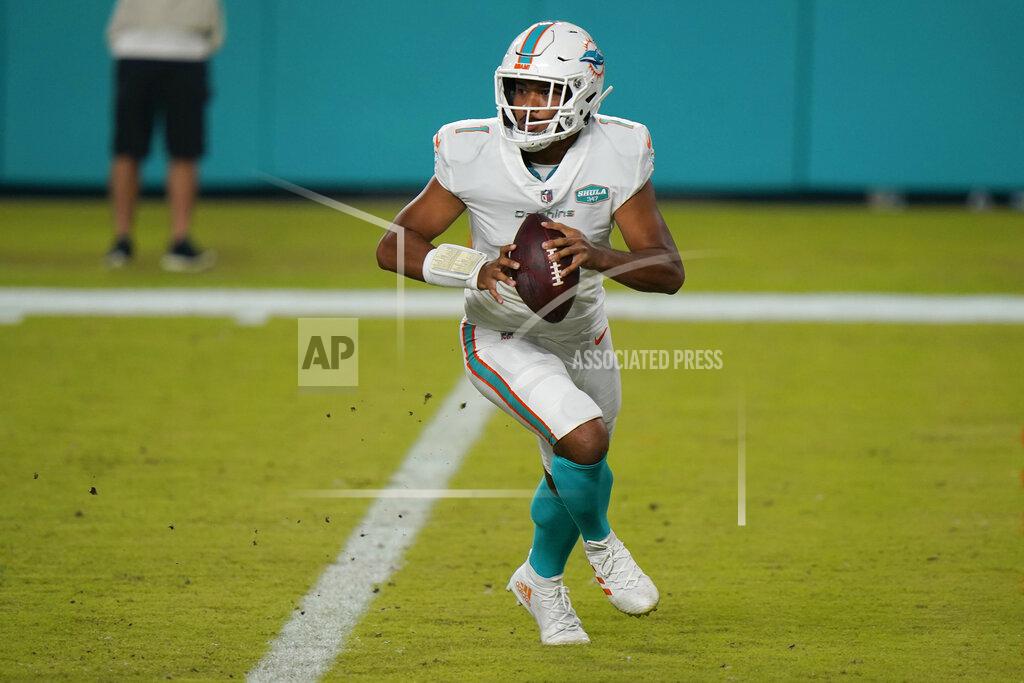 Miami Dolphins quarterback Tua Tagovailoa (1) looks to pass the ball during the second half of an NFL football game against the New York Jets, Sunday, Oct. 18, 2020, in Miami Gardens, Fla. Hopes are high Tagovailoa will be the best of the 22 quarterbacks to start for Miami since Dan Marino retired following the 1999 season. (AP Photo/Lynne Sladky)