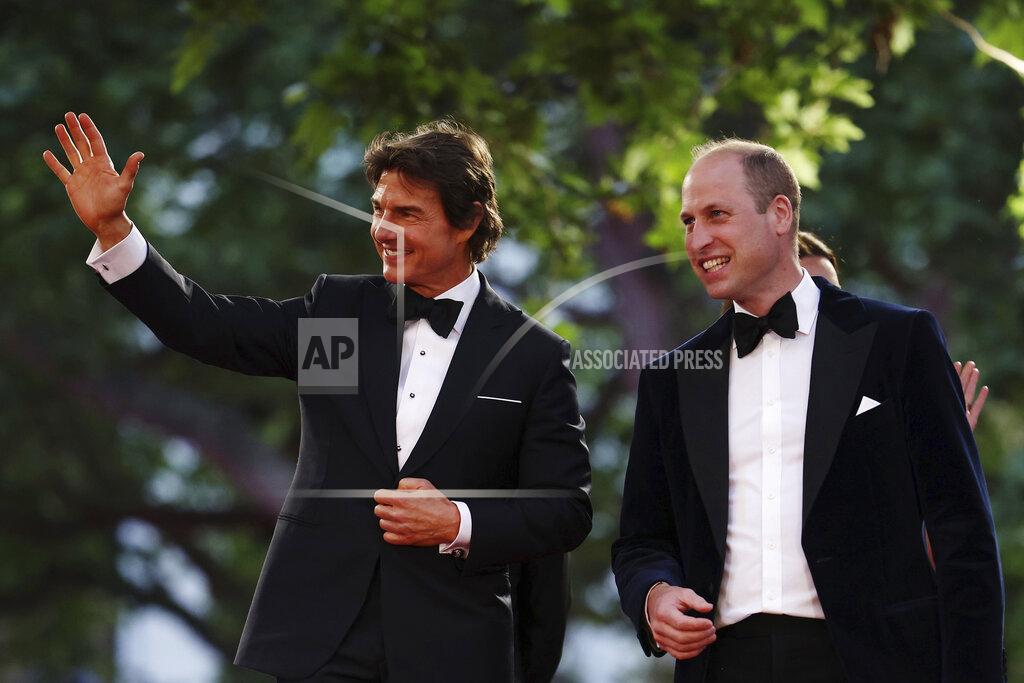 Dan Kitwood Britain's Prince William and actor Tom Cruise, left, acknowledge the crowd as they attend the 'Top Gun Maverick' UK premiere at a central London cinema, on Thursday, May 19, 2022. (Dan Kitwood/Pool via AP)