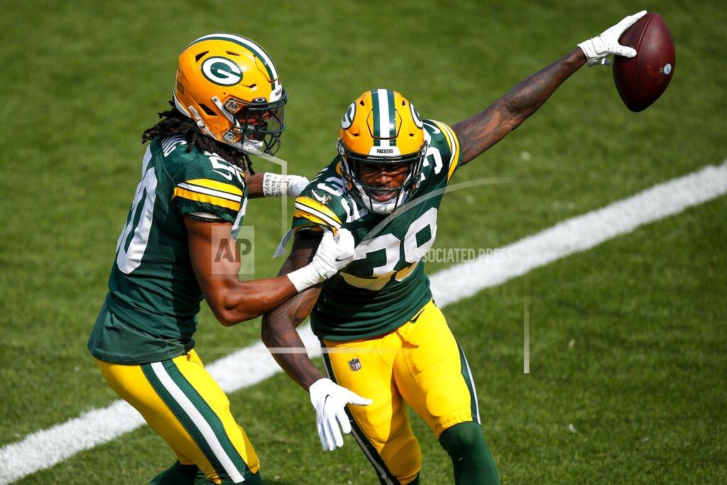 Matt Ludtke Green Bay Packers' Chandon Sullivan celebrates his interception and touchdown return with Kevin King during the second half of an NFL football game against the Detroit Lions Sunday, Sept. 20, 2020, in Green Bay, Wis. (AP Photo/Matt Ludtke)