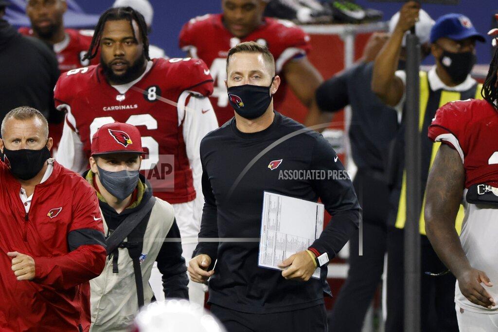 Ron Jenkins Arizona Cardinals head coach Kliff Kingsbury, center in black, jogs onto the field after their 38-10 win against the Dallas Cowboys in an NFL football game in Arlington, Texas, Monday, Oct. 19, 2020. (AP Photo/Ron Jenkins)