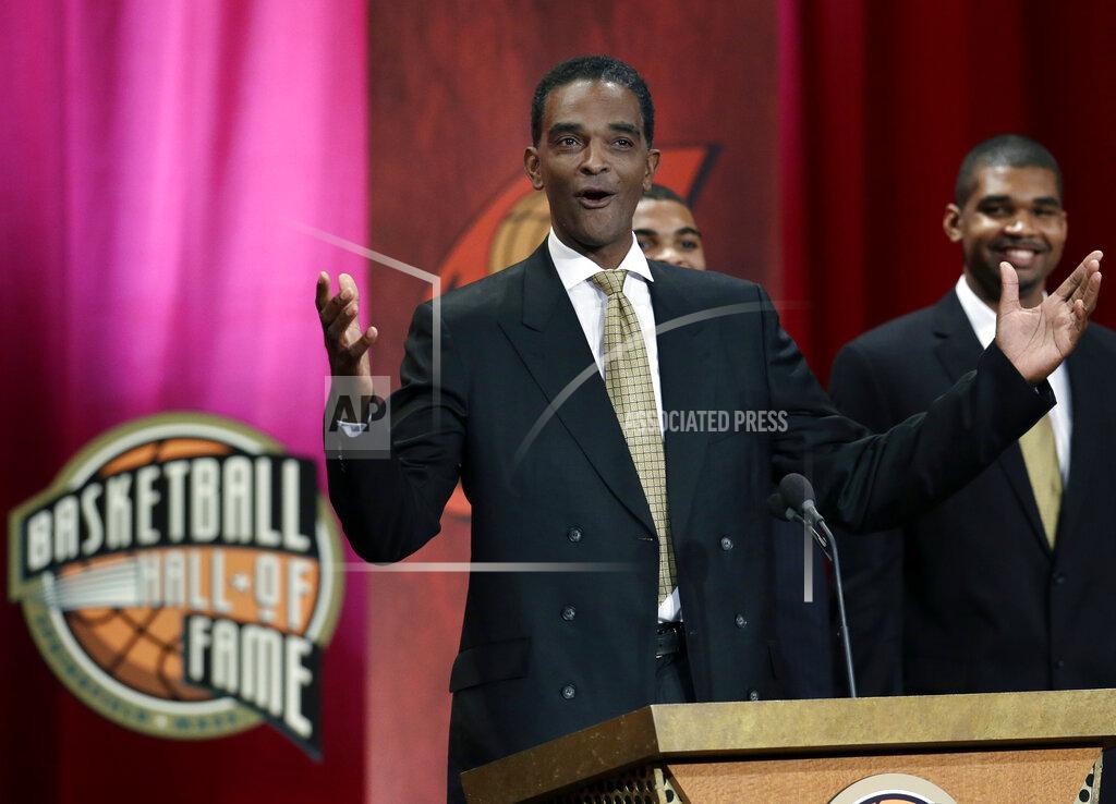 Elise Amendola FILE - In this Sept. 7, 2012, file photo, inductee Ralph Sampson reacts as he speaks during the enshrinement ceremony for the 2012 class of the Naismith Memorial Basketball Hall of Fame at Symphony Hall in Springfield, Mass. Virginia's basketball program, which gave us one of the sport's greatest players in Sampson and its two biggest upsets, by Division II Chaminade and the world's most famous 16 seed in UMBC, is now on the verge of writing a new chapter _ one that would not be appreciated by nearly as many people were it not for the huge platform Virginia hoops helped create.
(AP Photo/Elise Amendola, File)