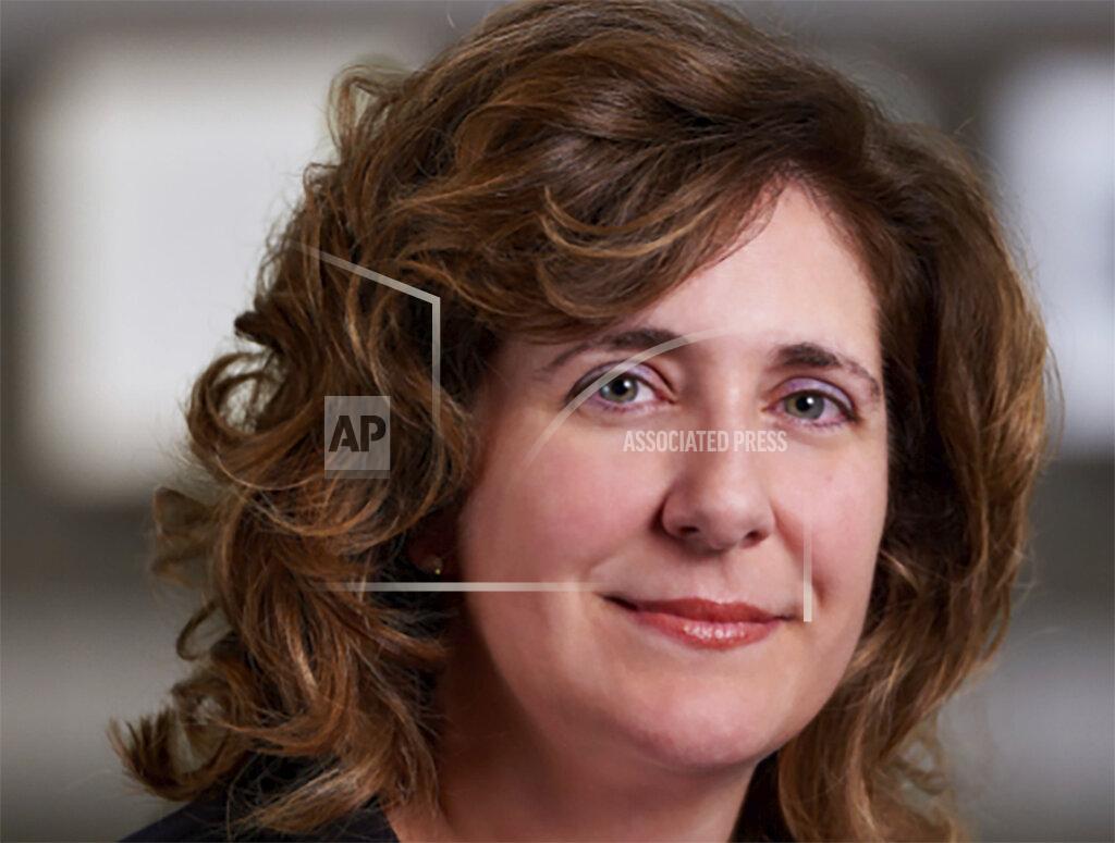 Tom Fuldner This 2018 photo provided by Tom Fuldner shows Elizabeth Peeler. Peeler, an events planner, is concerned that large gatherings may not resume for more than a year due to the new coronavirus. (Tom Fuldner via AP)
