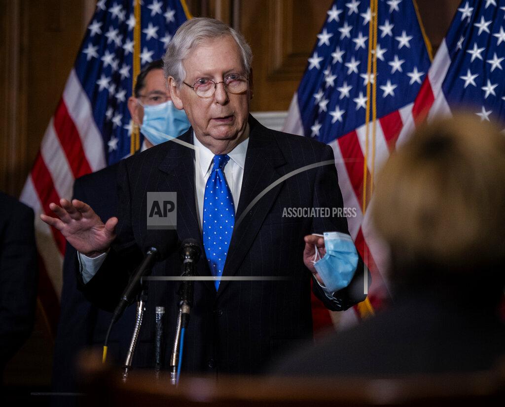 Bill O'leary Senate Majority Leader Mitch McMcConnell of Ky., speaks to reporters on Capitol Hill in Washington, Tuesday, Dec. 1, 2020. (Bill O'Leary/Pool via AP)