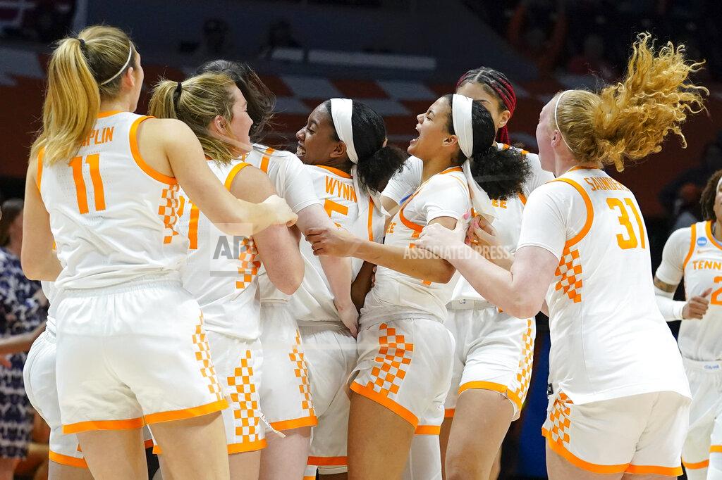 Mark Humphrey Tennessee players celebrate after beating Belmont in a women's college basketball game in the second round of the NCAA tournament Monday, March 21, 2022, in Knoxville, Tenn. (AP Photo/Mark Humphrey)
