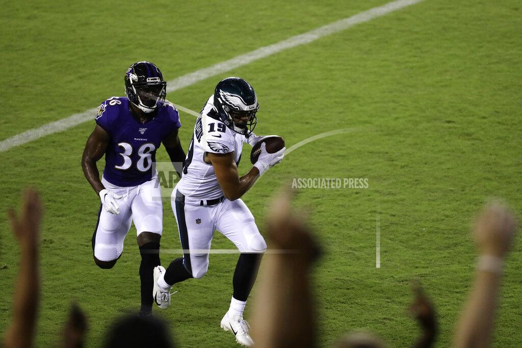 Michael Perez Philadelphia Eagles' JJ Arcega-Whiteside (19) scores a touchdown past Baltimore Ravens' Stanley Jean-Baptiste (38) during the second half of a preseason NFL football game Thursday, Aug. 22, 2019, in Philadelphia. (AP Photo/Michael Perez)