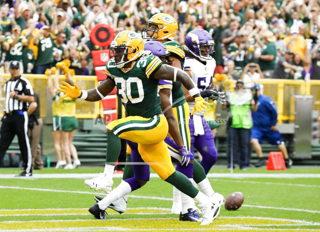 Mike Roemer Green Bay Packers' Jamaal Williams celebrates his touchdown during the first half of an NFL football game against the Minnesota Vikings Sunday, Sept. 15, 2019, in Green Bay, Wis. (AP Photo/Mike Roemer)