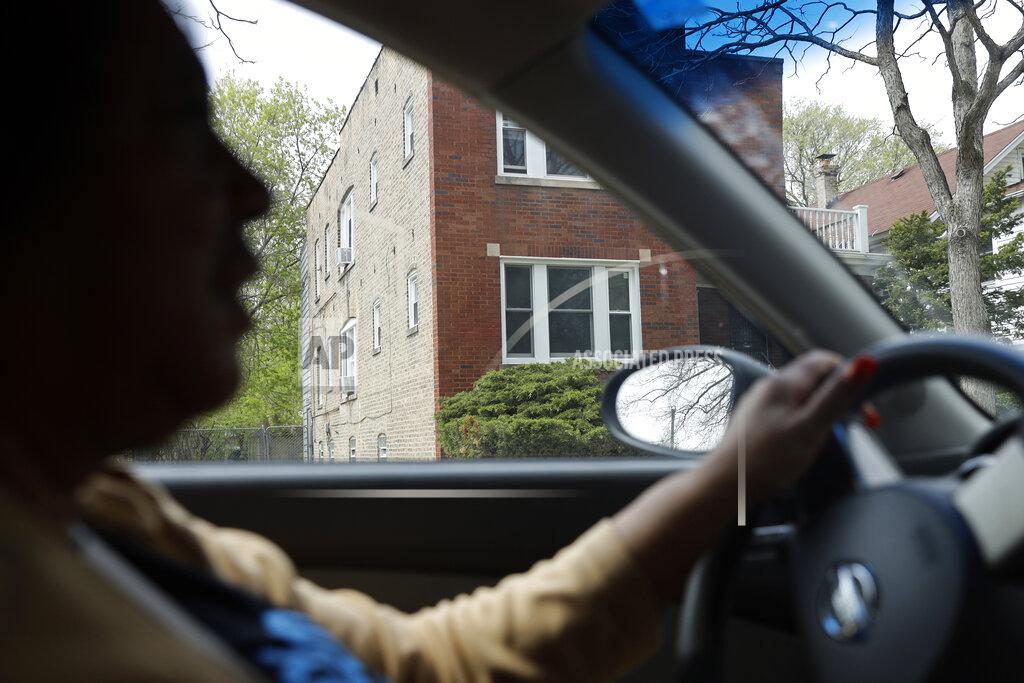 Shafkat Anowar Lifelong Evanston resident Jo-Ann Cromer parks outside her 5th Ward Evanston, Ill., home, where she has been living since the early 70s, on Thursday, April 29, 2021. The Chicago suburb is preparing to pay reparations in the form of housing grants to Black residents who experienced housing discrimination. Cromer plans on applying. “Real estate represents wealth. I don’t think people understand if Black people had been allowed to buy property, there would be a lot of wealthy Black people in Evanston,” Cromer said. “There would be a path of wealth, generation to generation.” (AP Photo/Shafkat Anowar)