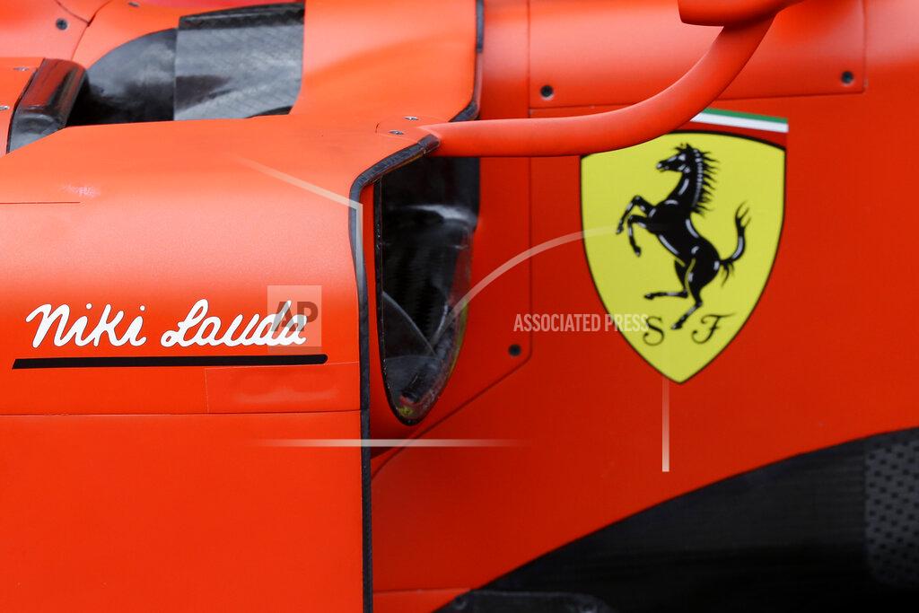 Luca Bruno The name of three-time Formula One world champion Niki Lauda is seen on the car of Ferrari driver Sebastian Vettel of Germany during the first practice session at the Monaco racetrack, in Monaco, Thursday, May 23, 2019. The Formula one race will be held on Sunday. Three-time Formula One world champion Niki Lauda, who won two of his titles after a horrific crash that left him with serious burns and went on to become a prominent figure in the aviation industry, has died on May 21, 2109. He was 70. (AP Photo/Luca Bruno)