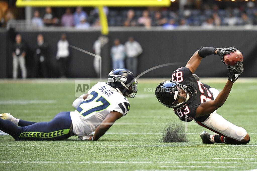 Danny Karnik Atlanta Falcons wide receiver Russell Gage (83) makes the catch against Seattle Seahawks defensive back Marquise Blair (27) during the second half of an NFL football game, Sunday, Oct. 27, 2019, in Atlanta. The Seattle Seahawks won 27-20. (AP Photo/Danny Karnik)
