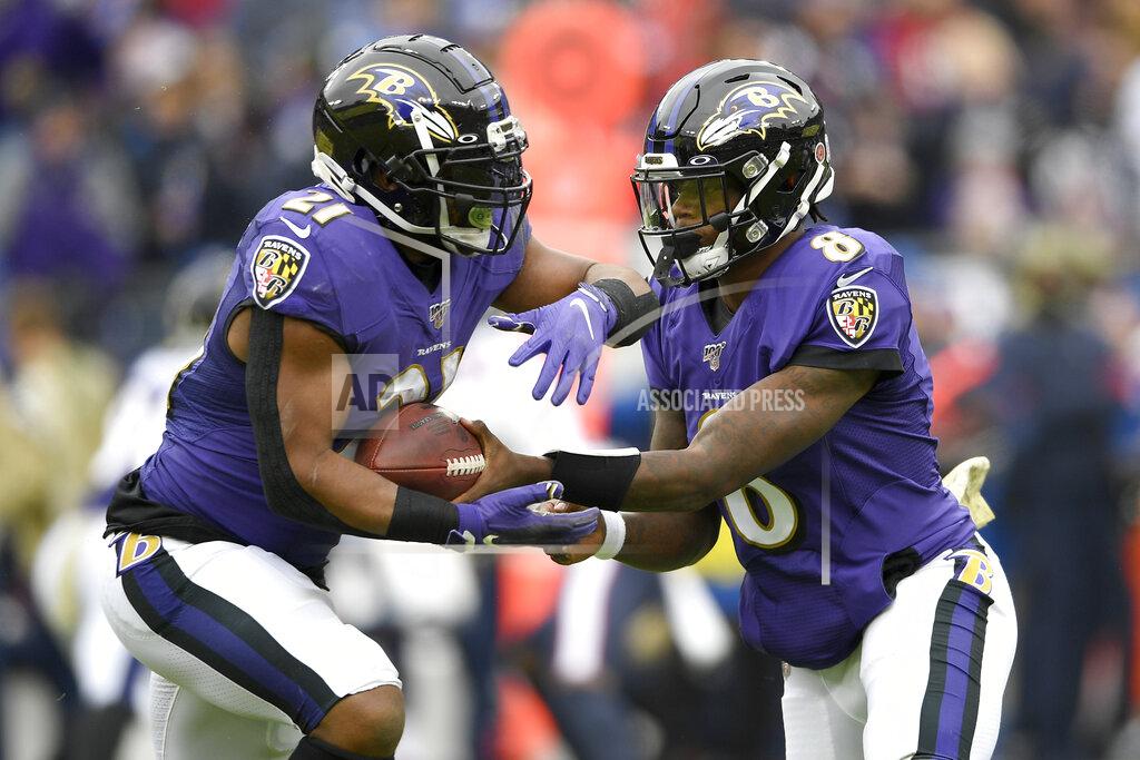 Nick Wass Baltimore Ravens quarterback Lamar Jackson (8) hands off to running back Mark Ingram (21) during the first half of an NFL football game against the Houston Texans, Sunday, Nov. 17, 2019, in Baltimore. (AP Photo/Nick Wass)