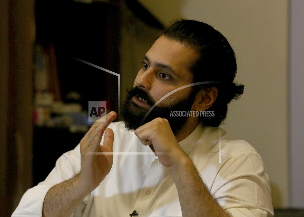 Fareed Khan Jibran Nasir, lawyer of Arzoo Raja, a teenage Christian girl, who was allegedly abducted and forced to convert and marry a 44-year old Muslim, speaks during an interview in Karachi, Pakistan, on Tuesday, Nov. 10, 2020. Nasir says a "mafia" of Islamic clerics, magistrates and local police preys on non-Muslim girls because they are the most vulnerable and the easiest targets “for older men with pedophilia urges.” (AP Photo/Fareed Khan)