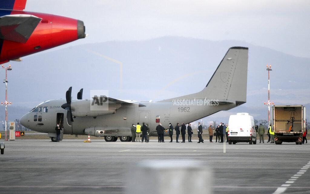Russia's Sputnik V coronavirus vaccines arrive at Kosice Airport, Slovakia, Monday March 1, 2021. Hard-hit Slovakia signed a deal to acquire 2 million dozes of Russia’s Sputnik V coronavirus vaccine. The country's prime minister says Slovakia will get one million shots in next two months while another million will arrive in May and June. (Frantisek Ivan/TASR via AP)