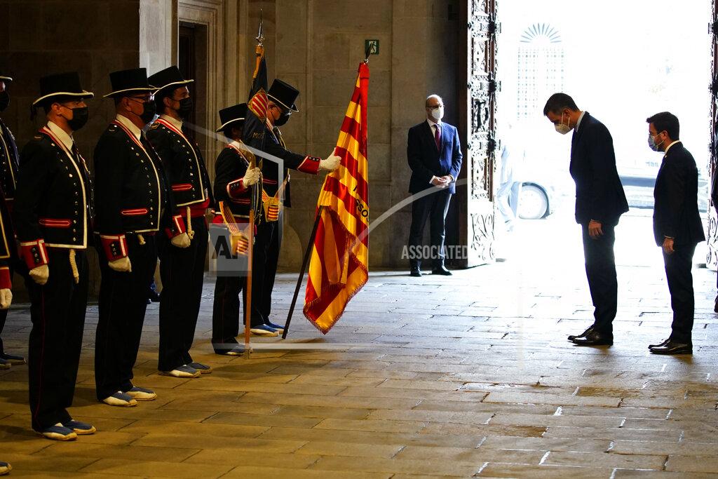 Joan Mateu Parra Spanish Prime Minister Pedro Sanchez and Catalonian regional president Pere Aragonès, right, arrive at the headquarter of the Government of Catalonia in Barcelona, Spain, Wednesday, Sept. 15, 2021. Spain's prime minister and the leader of Catalonia are restarting negotiations in hopes of finding a solution to the ongoing political crisis caused by the region's separatist movement. (AP Photo/Joan Mateu Parra)