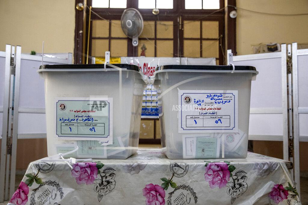 Nariman El-Mofty Ballot boxes sit on a table on the first day in the second and final stage of the country's parliamentary elections inside a polling station in Cairo, Egypt, Saturday, Nov. 7, 2020. Egyptians began voting on Saturday after a relatively low turnout in the first stage that embarrassed the government of President Abdel-Fattah el-Sissi. (AP Photo/Nariman El-Mofty)