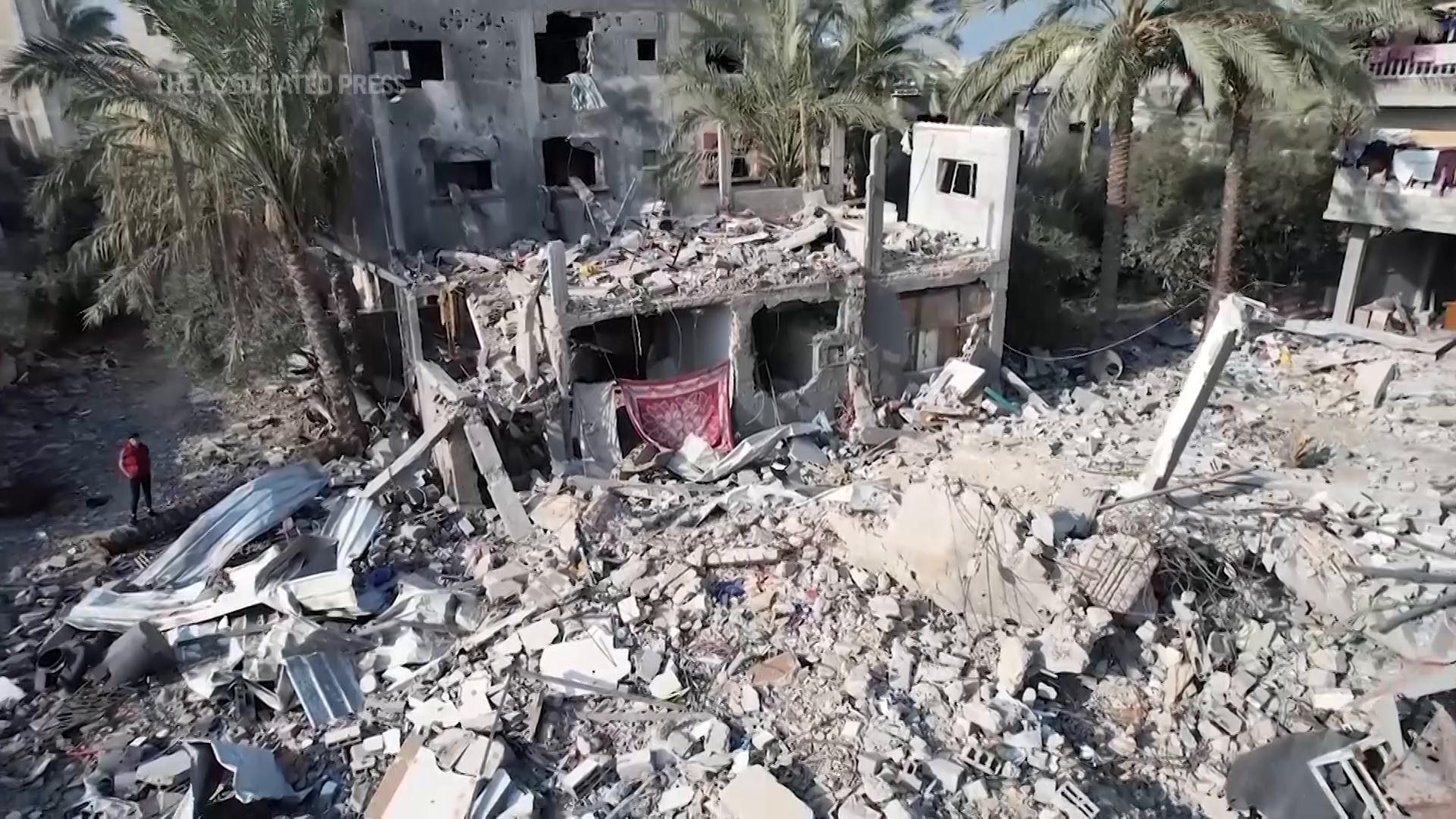 Drone video shows destruction of a residential building in Deir al-Balah in central Gaza caused by Israeli airstrike on the first day of the new year. (Jan 1 2024, AP Video/Abd Al Kareem Hana)