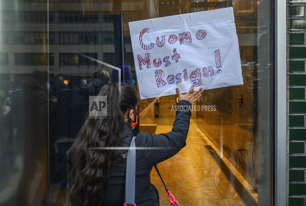 Brittainy Newman Patricia Avendano, 41, and other demonstrators rally for New York Gov. Andrew Cuomo's resignation in front of his Manhattan office in New York, Tuesday, March 2, 2021. Cuomo has avoided public appearances for days as some members of his own party call for him to resign over sexual harassment allegations. (AP Photo/Brittainy Newman)