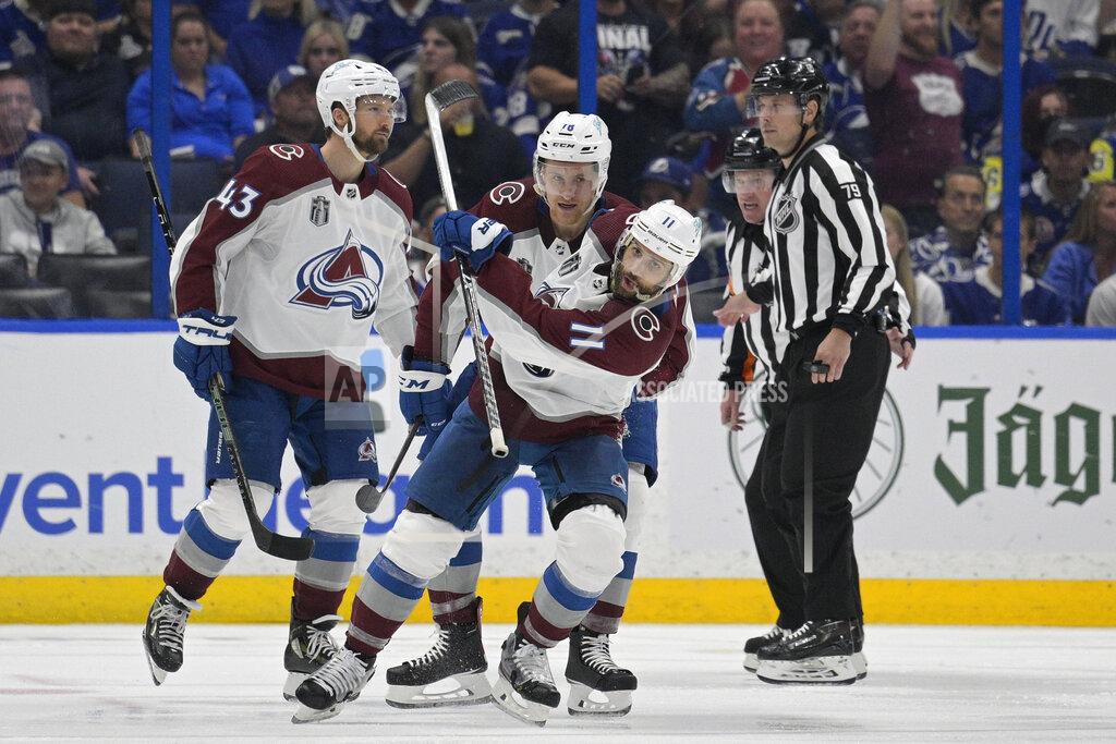 Phelan Ebenhack Colorado Avalanche center Andrew Cogliano (11) reacts after scoring during the third period of Game 4 of the NHL hockey Stanley Cup Finals against the Tampa Bay Lightning on Wednesday, June 22, 2022, in Tampa, Fla. (AP Photo/Phelan Ebenhack)