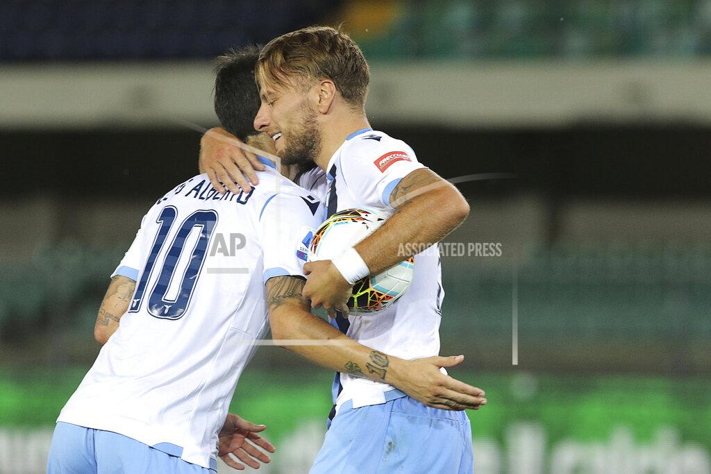 Paola Garbuio Ciro Immobile celebrates scoring a penalty against Hellas during Italian serie A soccer match between Verona and Lazio, at the Bentegodi stadium, in Verona, Italy, Sunday, July 26, 2020. (Paola Garbuio/Lapresse via AP)