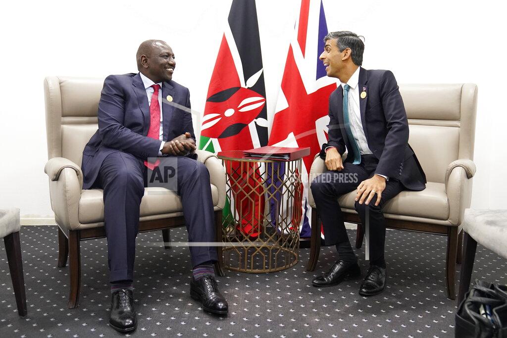 Stefan Rousseau FILE - Britain's Prime Minister Rishi Sunak, right, talks with Kenya's President William Ruto during their meeting at the COP27 summit, in Sharm el-Sheikh, Egypt, Nov. 7, 2022. In his first month as Britain's prime minister, Rishi Sunak has stabilized the economy, reassured allies from Washington to Kyiv and even soothed the European Union after years of sparring between Britain and the bloc. But Sunak’s challenges are just beginning. He is facing a stagnating economy, a cost-of-living crisis – and a Conservative Party that is fractious and increasingly unpopular after 12 years in power. (Stefan Rousseau/Pool Photo via AP, File)