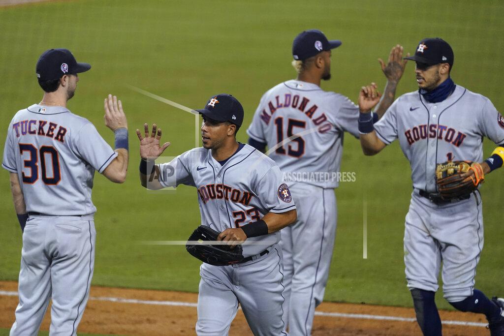 Ashley Landis The Houston Astros celebrate a 7-5 win over the Los Angeles Dodgers in a baseball game at Dodger Stadium on Saturday, Sept. 12, 2020, in Los Angeles. (AP Photo/Ashley Landis)