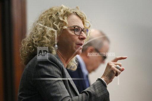 Defense attorney Laura Hogue speaks during the trial of William "Roddie" Bryan, Travis McMichael and Gregory McMichael, charged with the February 2020 death of 25-year-old Ahmaud Arbery, at the Glynn County Courthouse in Brunswick, Ga., Tuesday, Nov. 23, 2021. (Octavio Jones/Pool Photo via AP)