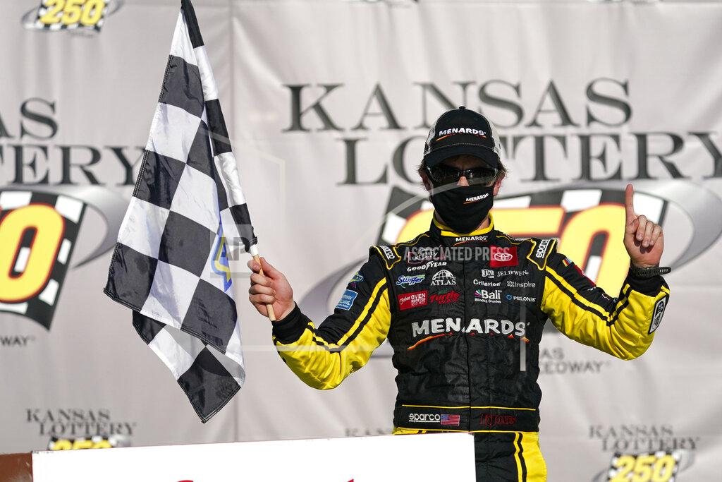 Charlie Riedel Brandon Jones celebrates after winning a NASCAR Xfinity Series auto race at Kansas Speedway in Kansas City, Kan., Saturday, July 25, 2020. (AP Photo/Charlie Riedel)