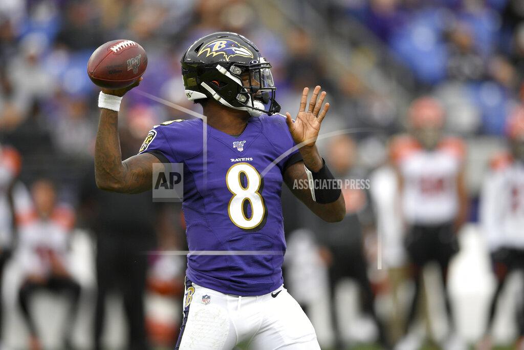 Nick Wass Baltimore Ravens quarterback Lamar Jackson looks to pass against the Cincinnati Bengals during the second half of a NFL football game Sunday, Oct. 13, 2019, in Baltimore. (AP Photo/Nick Wass)