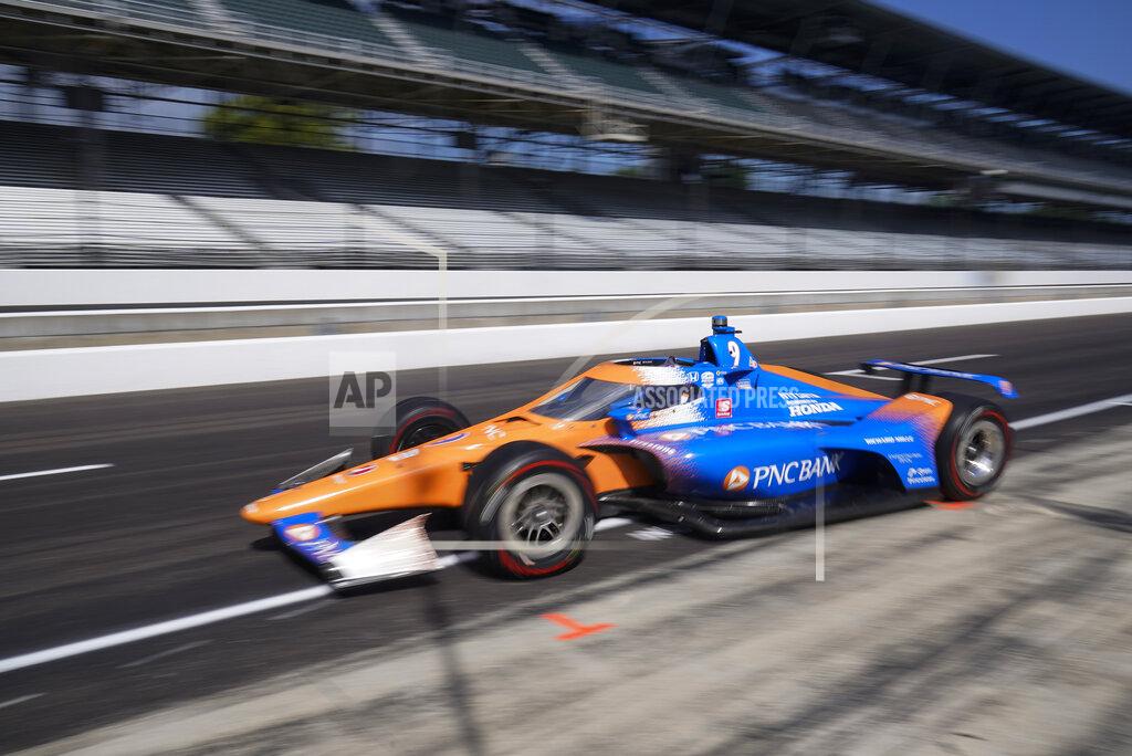Darron Cummings Scott Dixon, of New Zealand, leaves the pits during a practice session for the Indianapolis 500 auto race at Indianapolis Motor Speedway, Thursday, Aug. 13, 2020, in Indianapolis. (AP Photo/Darron Cummings)