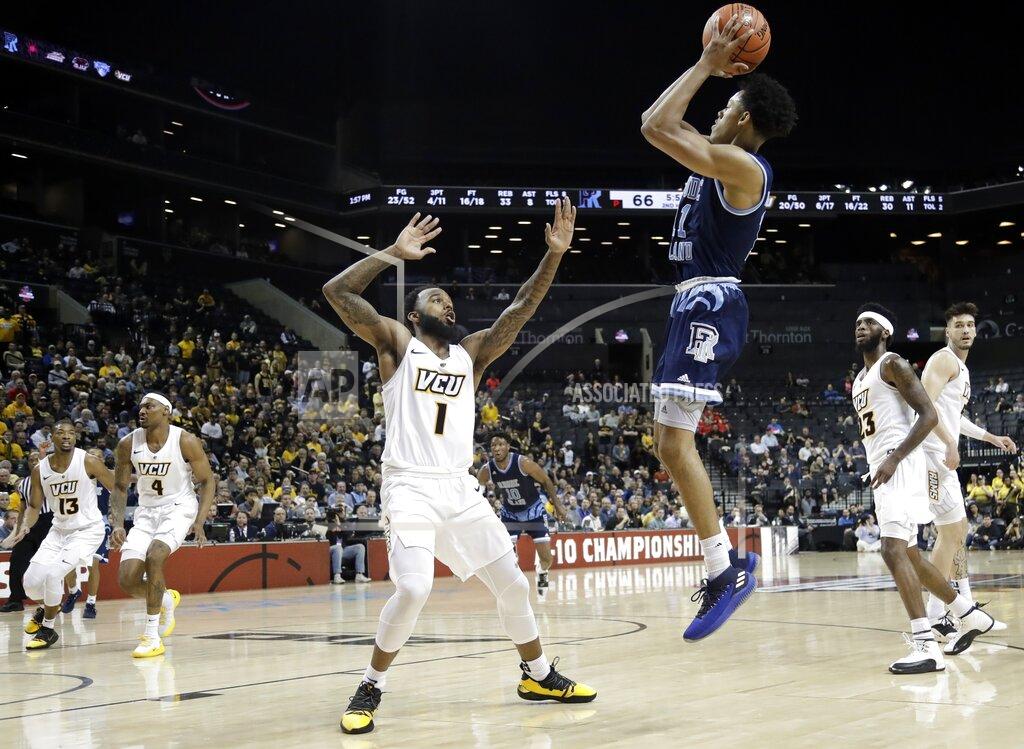 Frank Franklin Ii Rhode Island's Jeff Dowtin (11) shoots over VCU's Mike'L Simms (1) during the second half of an NCAA college basketball game in the Atlantic 10 men's tournament Friday, March 15, 2019, in New York. Rhode Island won 75-70. (AP Photo/Frank Franklin II)