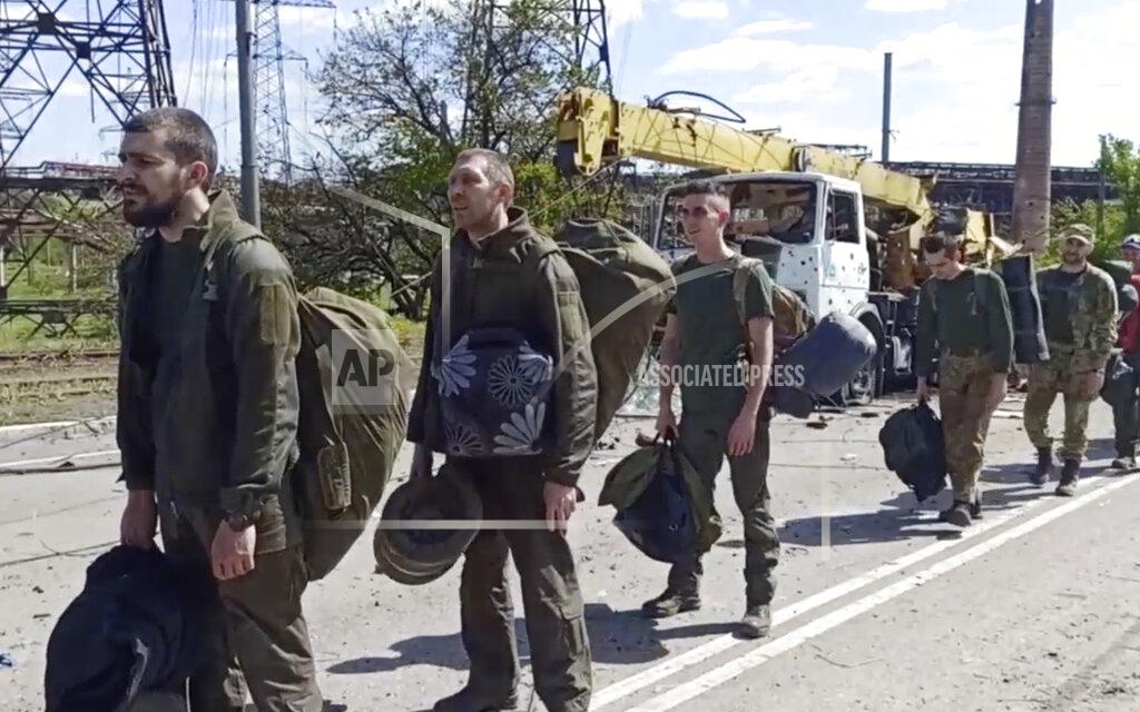 Uncredited In this photo taken from video released by the Russian Defense Ministry on Friday, May 20, 2022, Ukrainian servicemen are pictured as they leave the besieged Azovstal steel plant in Mariupol, in territory under the government of the Donetsk People's Republic, eastern Ukraine. (Russian Defense Ministry Press Service via AP)