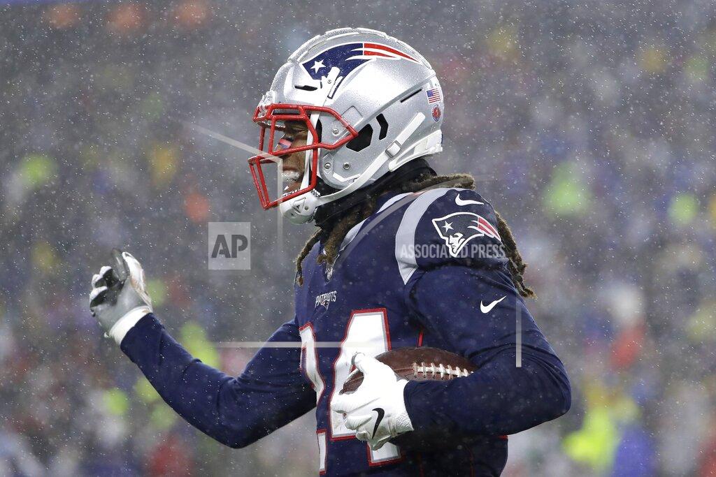 New England Patriots cornerback Stephon Gilmore celebrates his interception against the Dallas Cowboys in the first half of an NFL football game, Sunday, Nov. 24, 2019, in Foxborough, Mass. (AP Photo/Steven Senne)