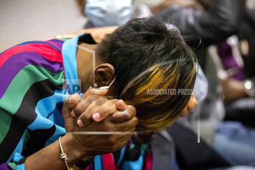 Ahmaud Arbery's mother, Wanda Cooper-Jones breaks down after the jury convicted Travis McMichael in the Glynn County Courthouse, Wednesday, Nov. 24, 2021, in Brunswick, Ga. (AP Photo/Stephen B. Morton, Pool)