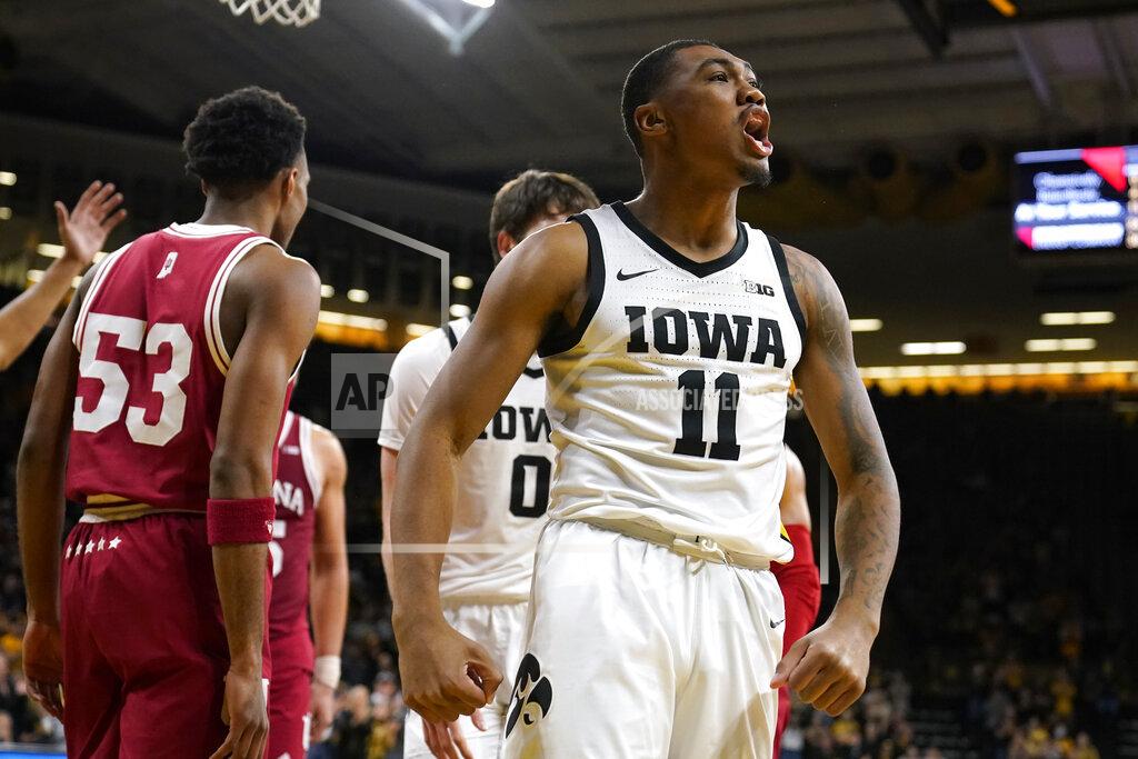 Charlie Neibergall Iowa guard Tony Perkins (11) celebrates after making a basket during the second half of an NCAA college basketball game against Indiana, Thursday, Jan. 13, 2022, in Iowa City, Iowa. (AP Photo/Charlie Neibergall)