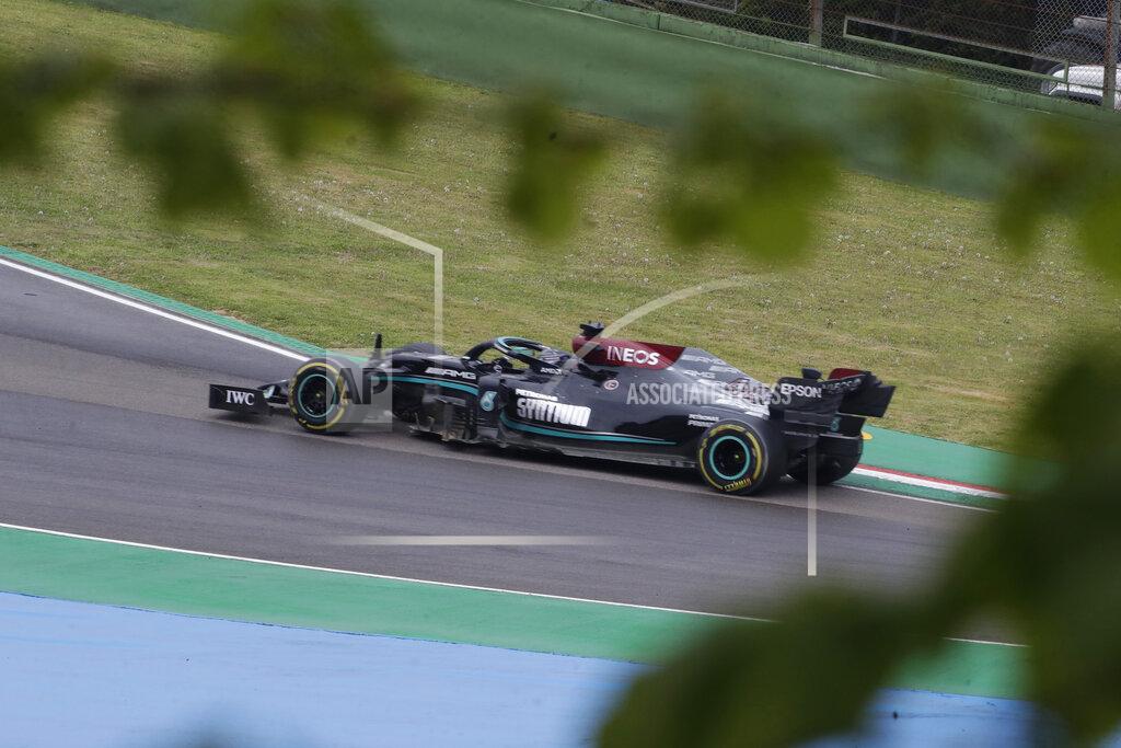 Luca Bruno Mercedes driver Lewis Hamilton of Britain steers his car during the Emilia Romagna Formula One Grand Prix, at the Imola racetrack, Italy, Sunday, April 18, 2021. (AP Photo/Luca Bruno)