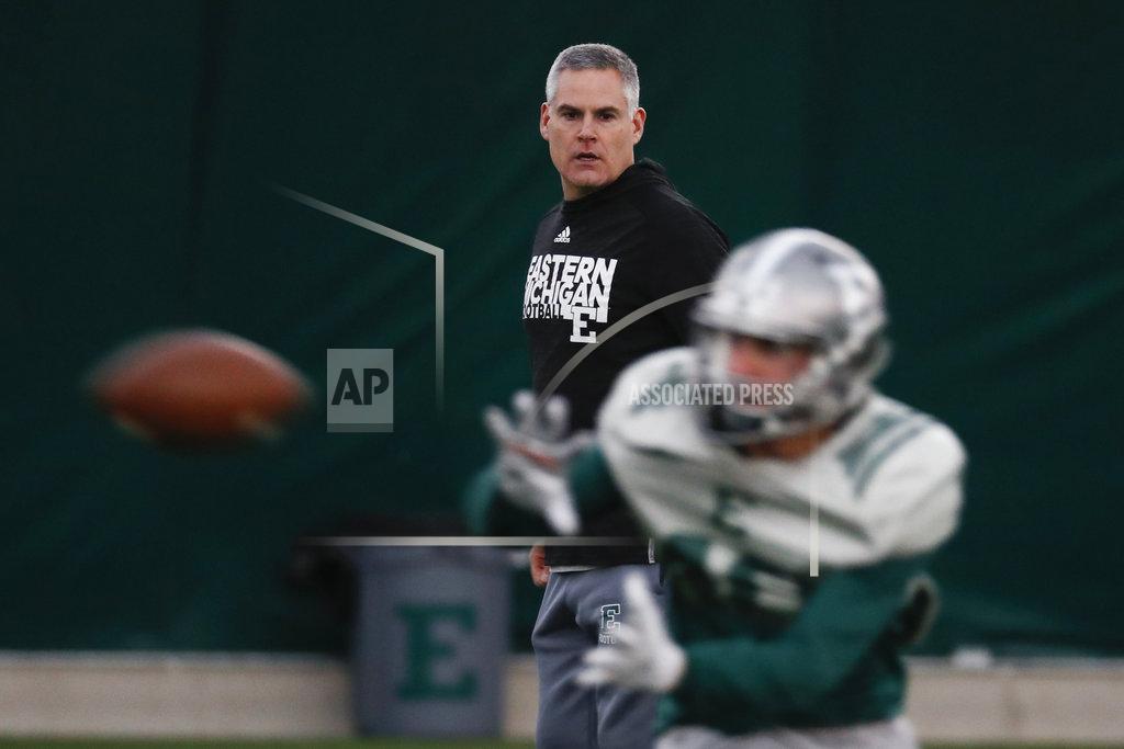 Paul Sancya Eastern Michigan football coach Chris Creighton watches during practice in Ypsilanti, Mich., Monday, Dec. 10, 2018. The Eagles will face Georgia Southern in the Camellia Bowl on Saturday, earning a spot in NCAA football postseason play for the second time in three years and just the third time in school history. (AP Photo/Paul Sancya)