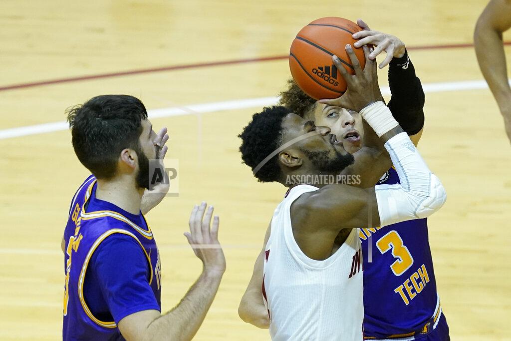 Darron Cummings Indiana's Al Durham (1) goes to the basket against Tennessee Tech's Shandon Goldman, left, and Keishawn Davidson during the second half of an NCAA college basketball game, Wednesday, Nov. 25, 2020, in Bloomington, Ind. (AP Photo/Darron Cummings)