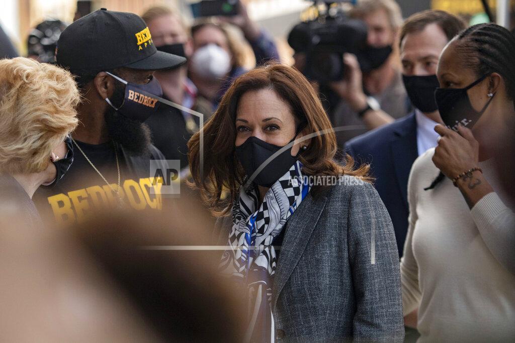 Nicole Hester Democratic vice presidential candidate Sen. Kamala Harris, D-Calif., greets supporters as she visits different business that have been impacted by the coronavirus pandemic, Tuesday Sept. 22, 2020 in Flint, Mich. (Nicole Hester/Ann Arbor News via AP)