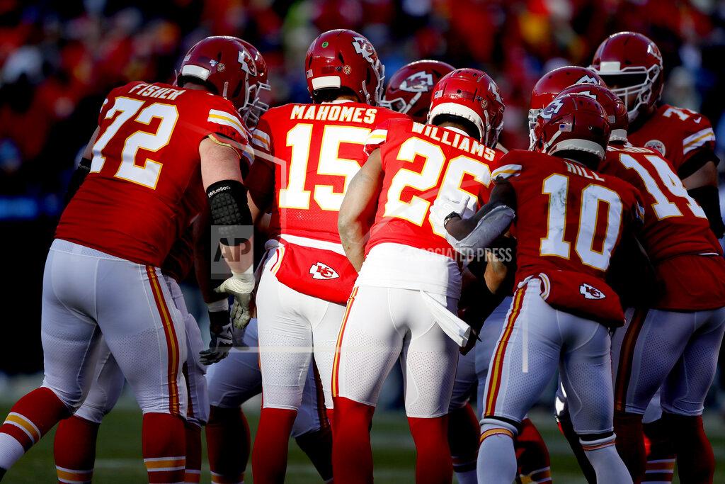 Charlie Neibergall Kansas City Chiefs' Patrick Mahomes huddles with teammates during the first half of the NFL AFC Championship football game against the Tennessee Titans Sunday, Jan. 19, 2020, in Kansas City, MO. (AP Photo/Charlie Neibergall)