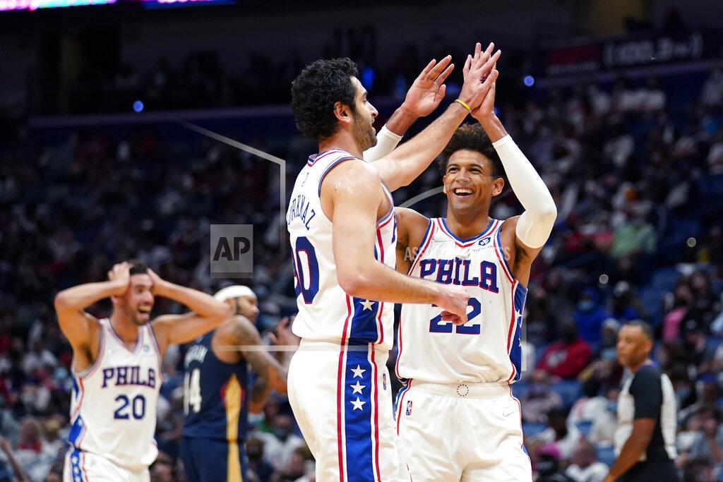 Gerald Herbert Philadelphia 76ers guard Furkan Korkmaz celebrates his 3-pointer with guard Matisse Thybulle (22) and forward Georges Niang (20) in the second half of an NBA basketball game in New Orleans, Wednesday, Oct. 20, 2021. The 76ers won 117-97. (AP Photo/Gerald Herbert)