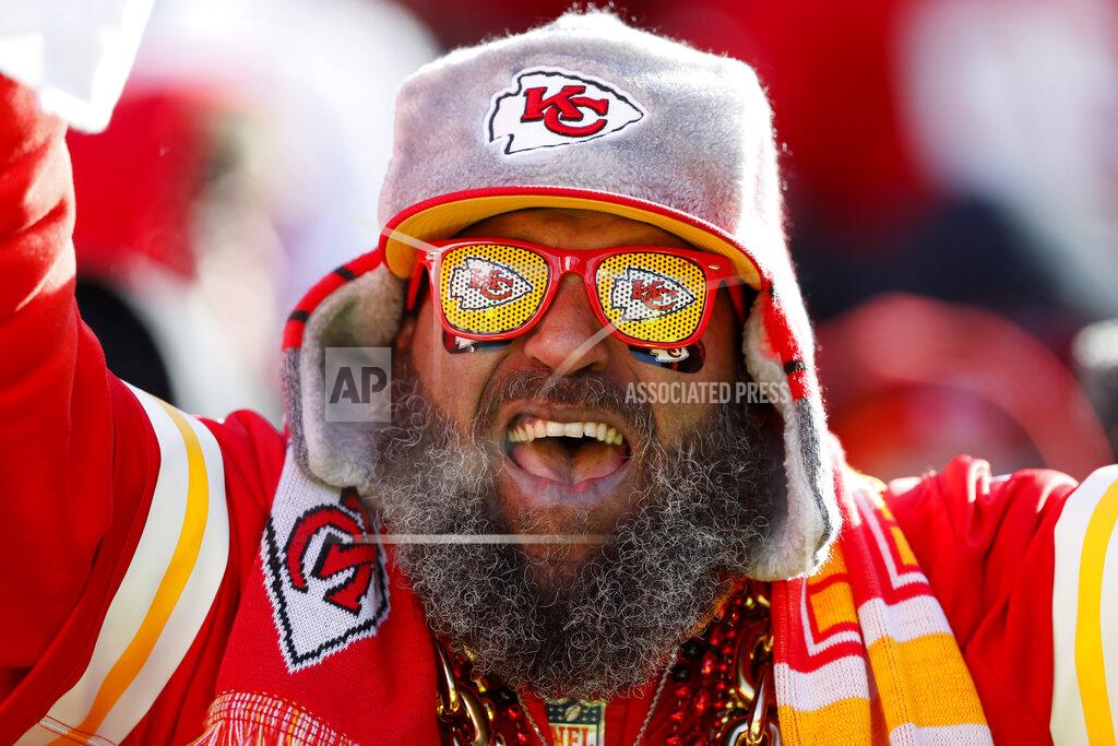 Charlie Neibergall A Kansas City Chiefs fan cheers during the first half of the NFL AFC Championship football game against the Tennessee Titans Sunday, Jan. 19, 2020, in Kansas City, MO. (AP Photo/Charlie Neibergall)