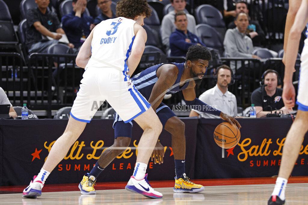 Jeff Swinger Memphis Grizzlies guard Shaq Buchanan is defended by Oklahoma City Thunder guard Josh Giddey (3) during the first half of an NBA summer league basketball game Wednesday, July 6, 2022, in Salt Lake City. (AP Photo/Jeff Swinger)