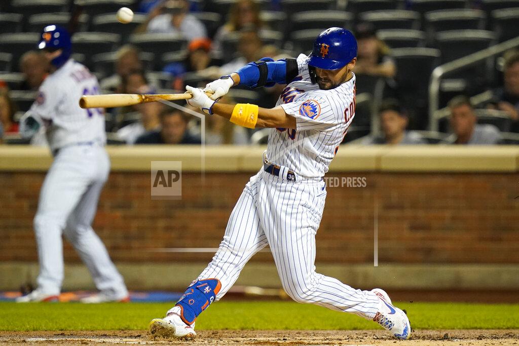 Frank Franklin Ii New York Mets' Michael Conforto hits an RBI single during the first inning of the team's baseball game against the St. Louis Cardinals on Tuesday, Sept. 14, 2021, in New York. (AP Photo/Frank Franklin II)